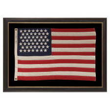 49 STARS ON A SMALL SCALE PIECED-AND-SEWN AMERICAN FLAG REFLECTING THE ADDITION OF ALASKA IN 1959, OFFICIAL FOR JUST ONE YEAR, MADE BY DETTRA IN OAKS, PENNSYLVANIA