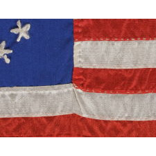 13 HAND-EMBROIDERED STARS AND EXPERTLY HAND-SEWN STRIPES ON AN ANTIQUE AMERICAN FLAG MADE IN PHILADELPHIA IN BY RACHEL ALBRIGHT OR SARAH M. WILSON, GRANDDAUGHTER AND GREAT GRANDDAUGHTER OF BETSY ROSS, 1898-1913