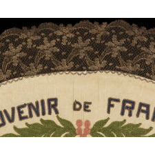 FRANCO-AMERICAN TEXTILE WITH THE IMAGE OF AN EAGLE SUPPORTING KNOTTED & DRAPED AMERICAN AND FRENCH FLAGS BENEATH FOUR WAR PLANES; EMBROIDERED SILK FLOSS AND METALLIC BULLION THREAD ON A SILK GROUND, WITH ELABORATE BULLION FRINGE, MADE TO CELEBRATE THE END OF WWI (U.S. INVOLVEMENT 1917-18)