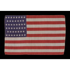 46 STARS IN CANTED ROWS ON AN ANTIQUE AMERICAN PARADE FLAG MADE OF SILK, 1907-1912, OKLAHOMA STATEHOOD