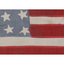 48 STARS ON AN AMERICAN FLAG MADE BY FRENCH RESISTANCE DURING WWII, PRESENTED TO THE 3RD SQUAD OF THE 8TH INFANTRY REGIMENT (MOTORIZED, 4TH INFANTRY DIVISION) FOLLOWING THEIR PARTICIPATION IN THE BATTLE OF NORMANDY, IN GRATITUDE OF THE NATION'S FORTHCOMING LIBERATION IN 1944, A WONDERFUL EXAMPLE