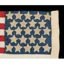 23 STARS ON AN ANTIQUE AMERICAN FLAG MADE IN THE PERIOD BETWEEN 1870 AND THE 1890's; AN EXTREMELY RARE STAR COUNT, PROBABLY MADE TO COMMEMORATE THE YEAR IN WHICH MAINE ENTERED THE UNION AS THE 23rd STATE, IN 1820