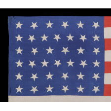 38 DANCING STARS ON A SILK ANTIQUE AMERICAN PARADE FLAG WITH GENEROUS SCALE AND VIVID COLORS, COLORADO STATEHOOD, 1876-1889