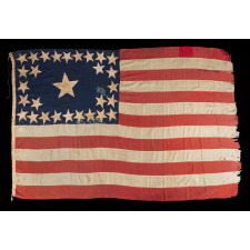 29 STARS IN A SPECTACULAR, RECTANGULAR MEDALLION WITH 4 STARS INSIDE THE PERIMETER AND A HUGE CENTER STAR ON AN OPEN BLUE EXPANSE; AMONG THE RAREST OF ALL KNOWN STAR COUNTS ON PIECED-AND-SEWN EXAMPLES, IOWA STATEHOOD, 1846-48, MEXICAN WAR PERIOD; EXHIBITED FROM JUNE – SEPTEMBER, 2021 AT THE MUSEUM OF THE AMERICAN REVOLUTION
