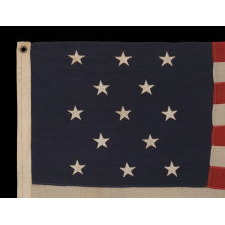 13 STARS ARRANGED IN A 3-2-3-2-3 PATTERN, ON A SMALL-SCALE ANTIQUE AMERICAN FLAG OF THE 1895-1926 ERA