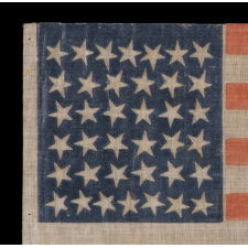 38 STAR ANTIQUE AMERICAN FLAG WITH SCATTERED STAR POSITIONING MADE DURING THE PERIOD WHEN COLORADO WAS THE MOST RECENT STATE TO JOIN THE UNION, 1876-1889
