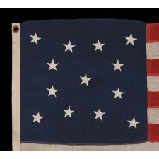 13 STARS IN A MEDALLION CONFIGURATION ON A SMALL-SCALE ANTIQUE AMERICAN FLAG OF THE 1890-1900 ERA