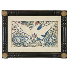 EXCEPTIONAL PATRIOTIC SCHERENSCHNITTE (PAPER CUTTING), IN THE STYLE OFTEN ATTRIBUTED TO ISAAC STIEHLY, ENTITLED “LIBERTY,” WITH IMAGERY THAT INCLUDES AN AMERICAN EAGLE WITH A 14-STAR, 13-STRIPE FLAG IN ITS BEAK, A RATTLESNAKE, AND SNOWFLAKE MEDALLIONS, CA 1830-1850