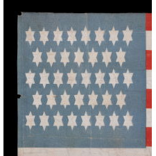 38 WHIMSICAL STARS, WITH 6-POINTED PROFILES, SIMILAR TO THE STAR OF DAVID, ON AN ANTIQUE AMERICAN FLAG OF THE CENTENNIAL ERA; A REMARKABLE SPECIMEN, ONE-OF-A-KIND AMONG KNOWN EXAMPLES, REFLECTS COLORADO STATEHOOD, 1876-1889