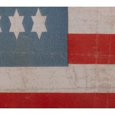 38 WHIMSICAL STARS, WITH 6-POINTED PROFILES, SIMILAR TO THE STAR OF DAVID, ON AN ANTIQUE AMERICAN FLAG OF THE CENTENNIAL ERA; A REMARKABLE SPECIMEN, ONE-OF-A-KIND AMONG KNOWN EXAMPLES, REFLECTS COLORADO STATEHOOD, 1876-1889