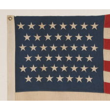 45 STARS ON AN ESPECIALLY ATTRACTIVE DENIM BLUE CANTON, A BEAUTIFUL EXAMPLE OF A COTTON BUNTING FLAG OF THIS PERIOD, 1896-1908, SPANISH-AMERICAN WAR ERA, UTAH STATEHOOD