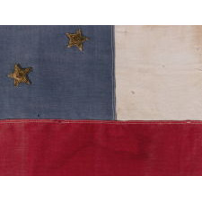 FIRST NATIONAL PATTERN CONFEDERATE FLAG WITH 8 METALLIC BULLION STARS, GOLD ON THE OBVERSE AND SILVER ON THE REVERSE, AN EARLY REUNION ERA EXAMPLE, MADE CA 1884-1910; THE STAR COUNT REFLECTING VIRGINIA’S SECESSION IN APRIL / MAY OF 1861