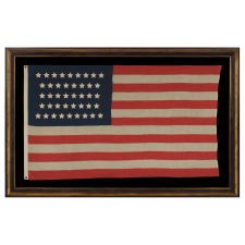 42 STARS IN AN HOURGLASS PATTERN ON AN ANTIQUE AMERICAN FLAG, AN UNOFFICIAL STAR COUNT, WASHINGTON STATEHOOD, 1889-90