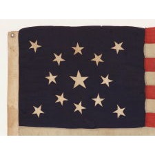 13 STARS IN A MEDALLION CONFIGURATION ON A SMALL-SCALE ANTIQUE AMERICAN FLAG OF THE 1895-1926 ERA