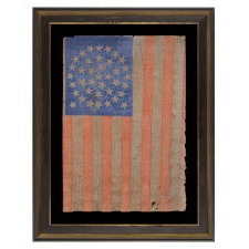 38 STAR FLAG WITH A TRIPLE-WREATH CONFIGURATION AND 2 OUTLIERS, ON AN ANTIQUE AMERICAN PARADE FLAG WITH RICH, CORNFLOWER BLUE COLORATION AND ENDEARING WEAR, 1876-1889, COLORADO STATEHOOD