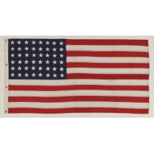 48 STAR FLAG & MATCHING COMMISSIONING PENNANT OF THE WWII ERA, SELDOM EVER FOUND IN A MATCHING PAIR, BROUGHT HOME BY U.S. NAVY AMPHIBIOUS FORCES GROUP SAILOR LUTHER VOIGHT LINGLE, WHO SERVED ON THE U.S.S. REEVES, THE FIRST AMERICAN SHIP TO DROP ANCHOR IN JAPANESE WATERS BEFORE THE SURRENDER