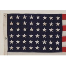 48 STAR FLAG & MATCHING COMMISSIONING PENNANT OF THE WWII ERA, SELDOM EVER FOUND IN A MATCHING PAIR, BROUGHT HOME BY U.S. NAVY AMPHIBIOUS FORCES GROUP SAILOR LUTHER VOIGHT LINGLE, WHO SERVED ON THE U.S.S. REEVES, THE FIRST AMERICAN SHIP TO DROP ANCHOR IN JAPANESE WATERS BEFORE THE SURRENDER