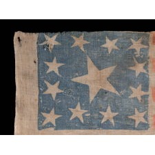 EXTRAORDINARILY RARE, PORTRAIT STYLE PARADE FLAG, MADE FOR THE PRESIDENTIAL CAMPAIGN OF JOHN FRÉMONT, WHO OPENED THE GATEWAY TO CALIFORNIA STATEHOOD, WAS THE REPUBLICAN PARTY’S FIRST PRESIDENTIAL CANDIDATE, AND RAN ON AN ANTI-SLAVERY PLATFORM; DISPLAYING 13 STARS, ARRANGED IN THE TRUMBULL PATTERN