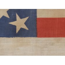36 STARS IN A MEDALLION CONFIGURATION ON A PARADE FLAG WITH A HUGE, HALOED CENTER STAR; A RARE EXAMPLE, LARGE IN SCALE, CIVIL WAR ERA, NEVADA STATEHOOD, 1864-67