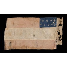 EXCEPTIONAL CONFEDERATE 1ST NATIONAL PATTERN BIBLE FLAG WITH A CRESCENT FORMATION OF 11 STARS, 2 OF WHICH APPEAR TO HAVE BEEN SUBSEQUENTLY ADDED AS MORE STATES SECEDED FROM THE UNION; MADE ca MARCH-MAY, 1861, UPDATED BETWEEN THEN AND OCTOBER; FOUND AMONG A COLLECTION OF LETTERS WRITTEN BY TWO NEW ENGLAND SOLDIERS, PROBABLE UNION CAPTURE