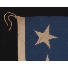 30 STARS ON AN ANTIQUE AMERICAN FLAG MADE IN THE PERIOD BETWEEN 1870 AND THE 1890's, PROBABLY TO COMMEMORATE THE YEAR IN WHICH WISCONSIN ENTERED THE UNION AS THE 30th STATE, IN 1848
