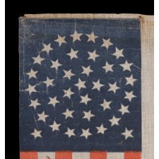 38 STARS IN A BEAUTIFUL MEDALLION CONFIGURATION WITH 2 OUTLIERS, ON AN ANTIQUE AMERICAN FLAG OF THE 1876-1889 ERA, COLORADO STATEHOOD
