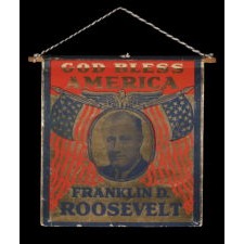 UNUSUAL, PRINTED FOIL WINDOW BANNER WITH STRIKING COLOR, A PORTRAIT OF FRANKLIN ROOSEVELT AND "GOD BLESS AMERICA" TEXT, MADE FOR THE 1940 PRESIDENTIAL CAMPAIGN