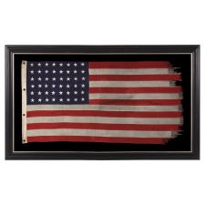 WWII VINTAGE ANTIQUE AMERICAN FLAG WITH 48 STARS AND ENDEARING WEAR FROM OBVIOUS LONG-TERM USE, A U.S. NAVY SMALL BOAT ENSIGN MARKED "No. 11"