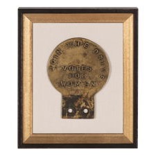 ANTIQUE BRASS SUFFRAGETTE CAR BADGE WITH TEXT THAT READS: "JOIN THE DRIVE" AND "VOTES FOR WOMEN," BRITISH, CA 1905-1914