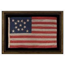 13 STARS IN A BEAUTIFUL MEDALLION CONFIGURATION ON A SMALL SCALE ANTIQUE AMERICAN FLAG MADE DURING THE LAST QUARTER OF THE 19TH CENTURY