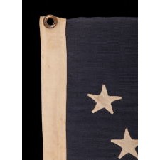 44 STAR FLAG WITH BEAUTIFULLY HAND-SEWN STARS IN AN HOURGLASS PATTERN ON A SOLDIER BLUE CANTON, AN ANTIQUE EXAMPLE; REFLECTS THE ADDITION OF WYOMING 1890-1896