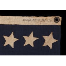 36 STARS ON AN ANTIQUE AMERICAN FLAG OF THE CIVIL WAR ERA, ENTIRELY HAND-SEWN, MADE BY ANNIN IN NEW YORK CITY; DESCENDED IN THE FAMILY OF MAJOR CHARLES HARROD BOYD OF PORTLAND, MAINE, A SURVEYOR ENGINEER FOR BOTH THE U.S. NAVY UNDER COMMODORE DUPONT, AND THE U.S. ARMY UNDER GENERALS J.G. BERNARD, W. L. ELLIOTT, AND GEORGE H. THOMAS; THE STAR COUNT REFLECTS NEVADA STATEHOOD, 1864-67