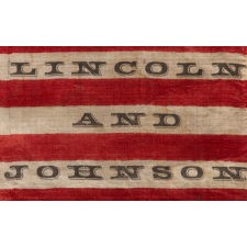 33 STARS IN A “GREAT STAR” PATTERN, ON A SILK ANTIQUE AMERICAN FLAG MADE FOR THE 1864 PRESIDENTIAL CAMPAIGN MADE FOR THE 1864 PRESIDENTIAL CAMPAIGN OF ABRAHAM LINCOLN AND ANDREW JOHNSON, ONE OF THREE KNOWN EXAMPLES IN THIS STYLE