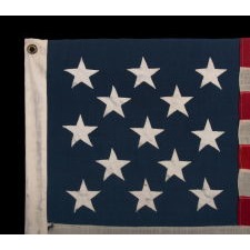 13 STARS IN A 3-2-3-2-3 CONFIGURATION ON A SMALL-SCALE, ANTIQUE AMERICAN FLAG OF THE 1895-1926 ERA
