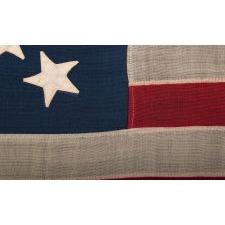 13 STAR FLAG WITH A BEAUTIFUL MEDALLION CONFIGURATION OF STARS; A SMALL-SCALE EXAMPLE, MADE CIRCA 1890-1895