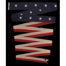 U.S. NAVY COMMISSION OR HOMEWARD-BOUND PENNANT WITH 14 STARS, MADE BY E.L. ROWE AND SONS OF GLOUCHESTER, MASSACHUSETTS, MADE CA 1890-1909, WITH VERBAL HISTORY OF USE IN TEDDY ROOSEVELT'S GREAT WHITE FLEET