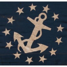 ANTIQUE AMERICAN PRIVATE YACHT ENSIGN WITH 13 SINGLE-APPLIQUÉD, HAND-SEWN STARS & CANTED ANCHOR, A BEAUTIFUL EXAMPLE WITH ENDEARING WEAR, MADE BY ANNIN IN NEW YORK CITY, CIRCA 1870-1885