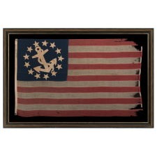 ANTIQUE AMERICAN PRIVATE YACHT ENSIGN WITH 13 SINGLE-APPLIQUÉD, HAND-SEWN STARS & CANTED ANCHOR, A BEAUTIFUL EXAMPLE WITH ENDEARING WEAR, MADE BY ANNIN IN NEW YORK CITY, CIRCA 1870-1885