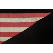 35 STAR AMERICAN CIVIL WAR FLAG, A SILK CAVALRY GUIDON WITH GILT-PAINTED STARS IN A DOUBLE WREATH ARRANGEMENT, REFLECTS WEST VIRGINIA STATEHOOD, CIRCA 1863-65; IN AN EXCEPTIONAL STATE OF PRESERVATION