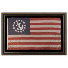 ANTIQUE AMERICAN PRIVATE YACHT FLAG (ENSIGN) WITH 13 STARS SURROUNDING A CANTED ANCHOR, MADE BY THE ANNIN COMPANY OF NEW YORK & NEW JERSEY, CIRCA 1945-1950’s