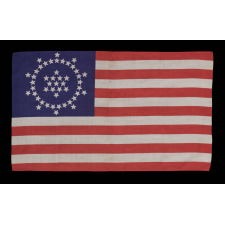 48 STARS ON AN ANTIQUE AMERICAN FLAG DESIGNED AND COMMISSIONED BY WAYNE WHIPPLE, 1911-1912, A RARE AND HIGHLY DESIRED, SILK EXAMPLE