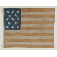 ENTIRELY HAND-SEWN AMERICAN NATIONAL FLAG WITH 13 STARS ON A TALL AND NARROW CANTON; A HOMEMADE EXAMPLE WITH INTERESTING PRESENTATION, MADE SOMETIME BETWEEN THE TAIL END OF THE CIVIL WAR AND THE 1876 CENTENNIAL