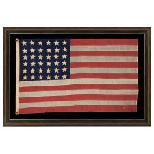 36 STARS ON AN ENTIRELY HAND-SEWN ANTIQUE AMERICAN FLAG OF THE CIVIL WAR ERA, STAR COUNT REFLECTS NEVADA STATEHOOD, 1864-1867; PROBABLY MADE BY ANNIN IN NEW YORK CITY