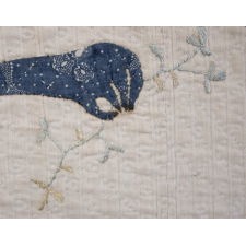 PRE-CIVIL WAR AMERICAN CRIB QUILT WITH A FEDERAL EAGLE, 16 EIGHT-POINTED STARS, AND 16 STRIPES UPON ITS BREAST, BLUE CALICO ON WHITE, CIRCA 1830-1850