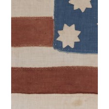 EXTRAORDINARY 34 STAR, CIVIL WAR PERIOD FLAG WITH EIGHT-POINTED STARS IN A "PROPELLER" MEDALLION ON ONE SIDE AND A DOUBLE-WREATH CONFIGURATION OF FIVE-POINTED STARS ON THE OTHER; A HOMEMADE EXAMPLE WITH ITS STRIPES STARTING AND ENDING ON WHITE; EXTREMELY SMALL IN SCALE AMONG ITS COUNTERPARTS AND A MASTERPIECE IN ALL RESPECTS, KANSAS STATEHOOD, 1861-1863