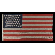 44 STARS IN ZIGZAGGING ROWS ON AN ANTIQUE AMERICAN AMERICAN FLAG MADE DURING THE LAST DECADE OF THE 19TH CENTURY, REFLECTS WYOMING STATEHOOD, 1890-1896