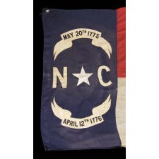 ANTIQUE STATE FLAG OF NORTH CAROLINA, MADE CIRCA 1900-WWI ERA (U.S. INVOLVEMENT 1917-18), MADE TO BE HAND-CARRIED ON A STAFF AND WITH BATTLE-FLAG-LIKE PROPORTIONS; IN SPITE OF ITS 1ST QUARTER 20TH CENTURY DATE, THIS IS THE EARLIEST EXAMPLE THAT I HAVE ENCOUNTERED IN PRIVATE HANDS: