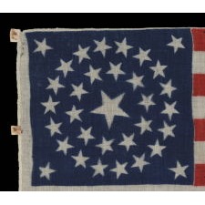 33 STAR ANTIQUE AMERICAN FLAG WITH A DOUBLE WREATH STAR CONFIGURATION, PRESS-DYED ON WOOL BUNTING, PROBABLY MADE FOR MILITARY USE AS CAMP COLORS OR A GUIDON, ONE-OF-A-KIND AMONG KNOWN EXAMPLES, WEST VIRGINIA STATEHOOD, 1863-1865