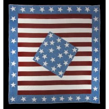 OUTSTANDING CIVIL WAR PATRIOTIC QUILT IN A DIAMOND-IN-A-SQUARE PATTERN SOURCED FROM PETERSON'S MAGAZINE, JULY 1861, MODIFIED BY THE MAKER TO INCLUDE 35 STARS AROUND THE PERIMETER AND A SOUTHERN-EXCLUSIONARY COUNT OF 20 STARS IN THE CENTER, 1863-1864