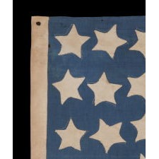 ANTIQUE AMERICAN FLAG WITH 36 STARS ON A CORNFLOWER BLUE CANTON, CIVIL WAR ERA, 1864-1867, REFLECTS THE ADDITION OF NEVADA AS THE 36TH STATE; A GREAT FOLK EXAMPLE WITH HAPHAZARD ROWS OF STARFISH-LIKE STARS